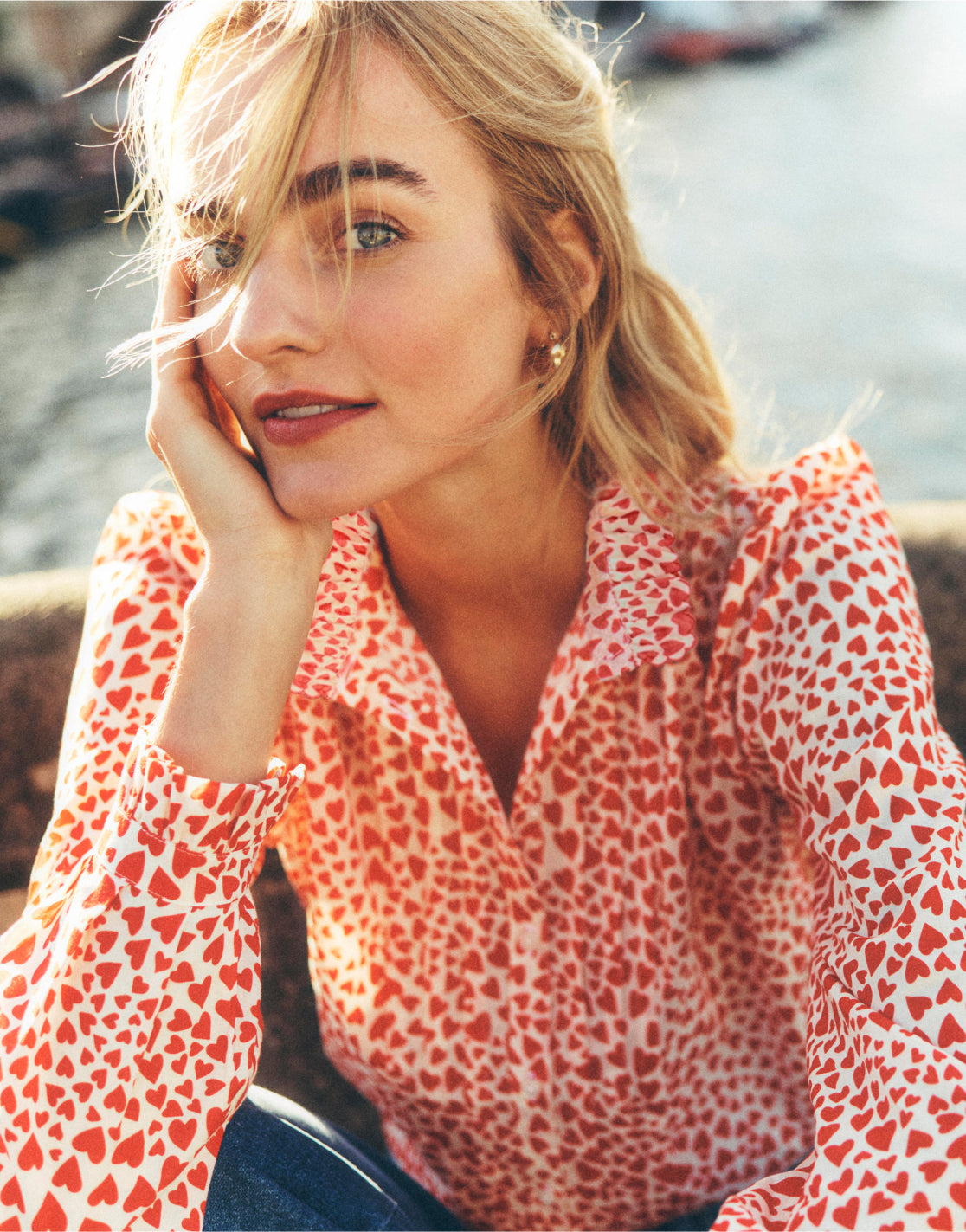 Woman wearing a Boden love heart shirt