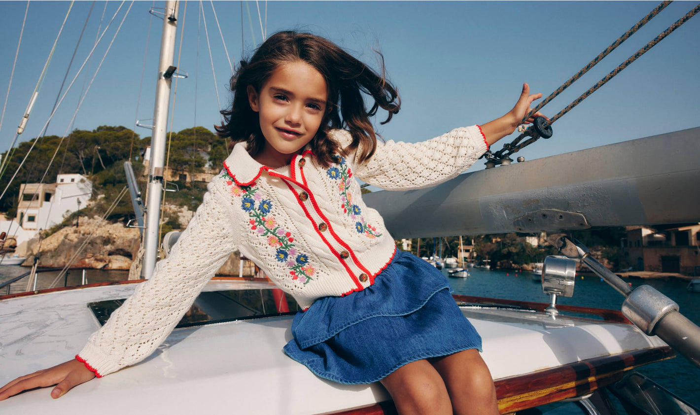 girl sitting on boat