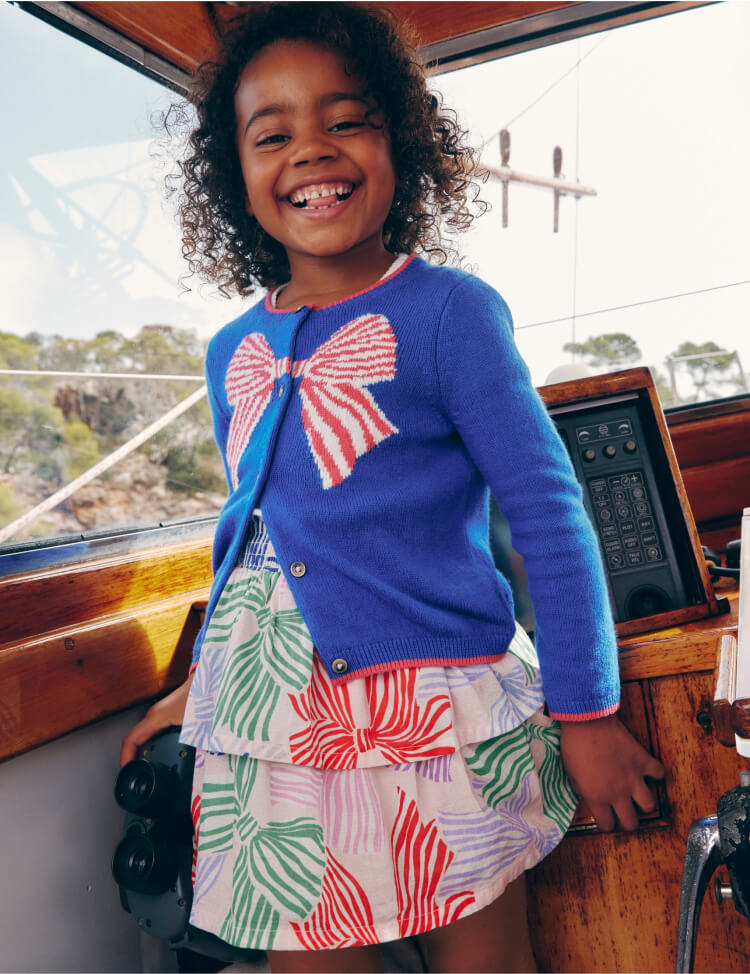 girl smiling on boat 